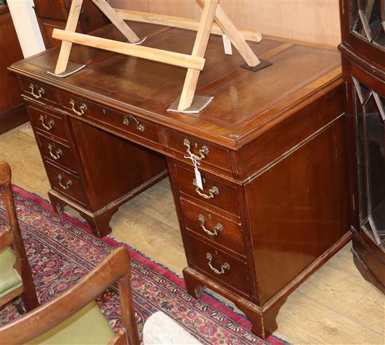 A 1920s mahogany pedestal desk W.137cm